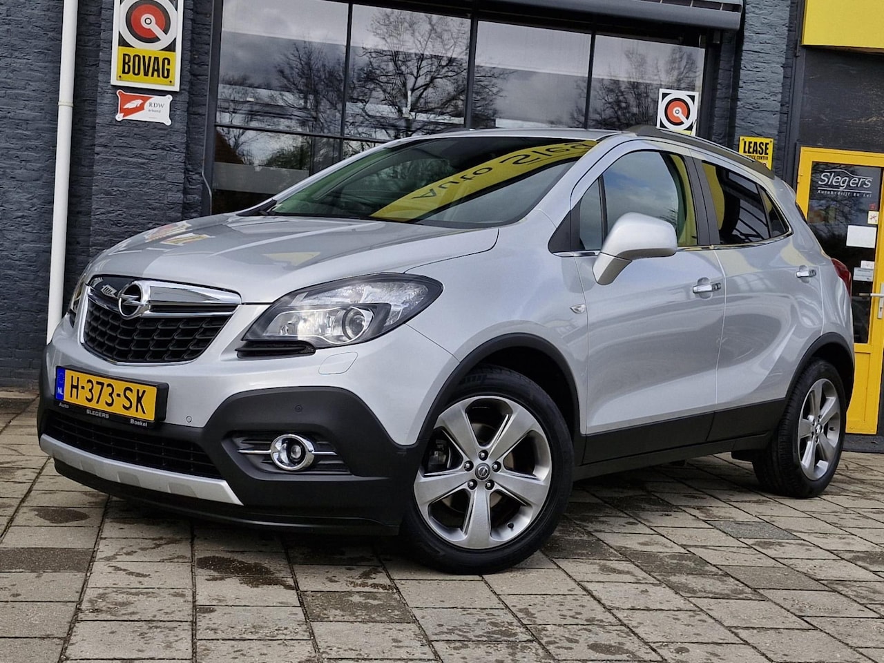 Opel Mokka - 1.4 T Cosmo 4x4 | Stoelverw. | Stuurverw. | Park. Camera | Navigatie | Telefoon | Uitklapb - AutoWereld.nl