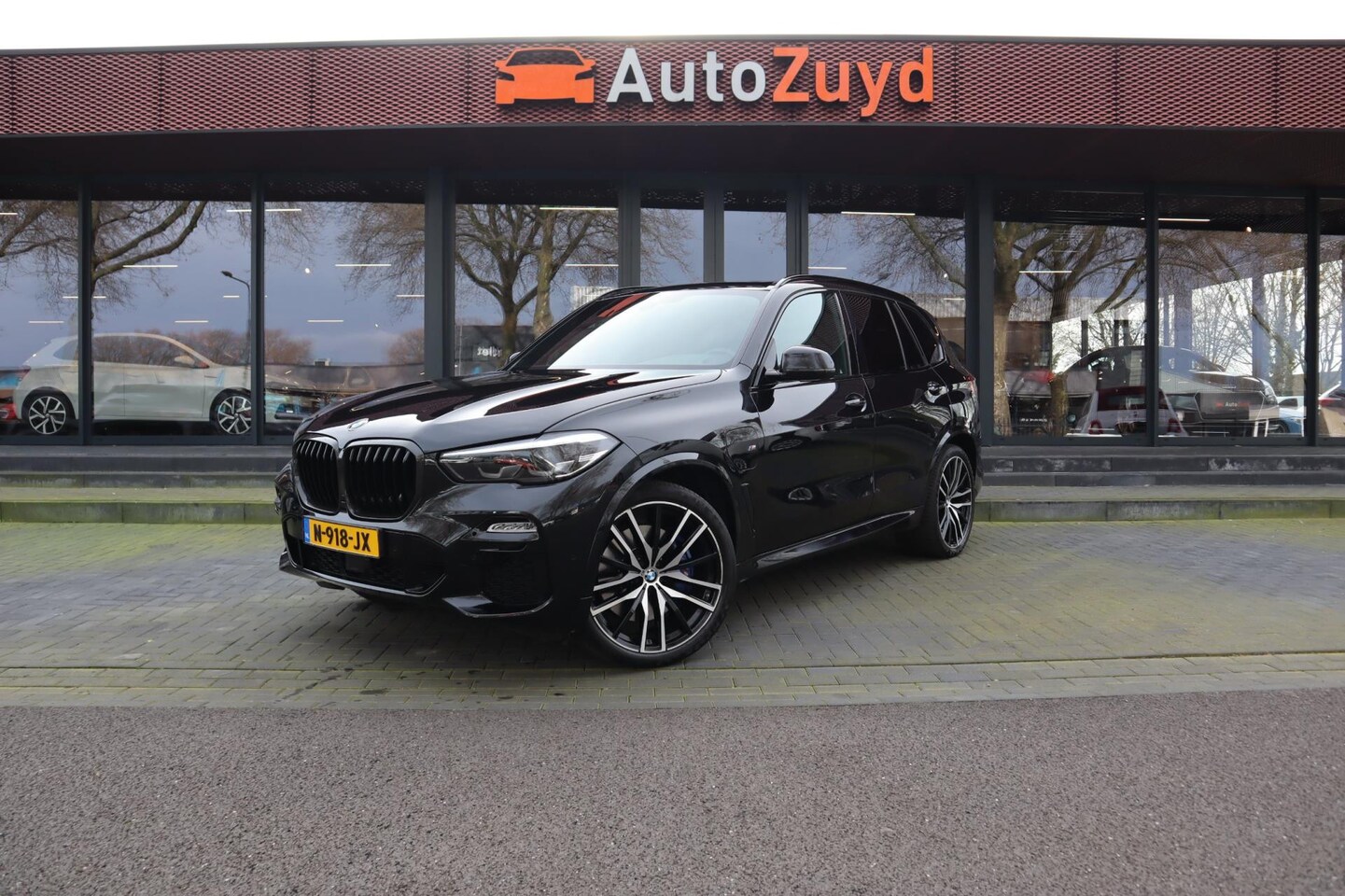 BMW X5 - XDrive45e High Executive M-Sport Navi / Pano / Leder / Ad. Cruise / DAB - AutoWereld.nl