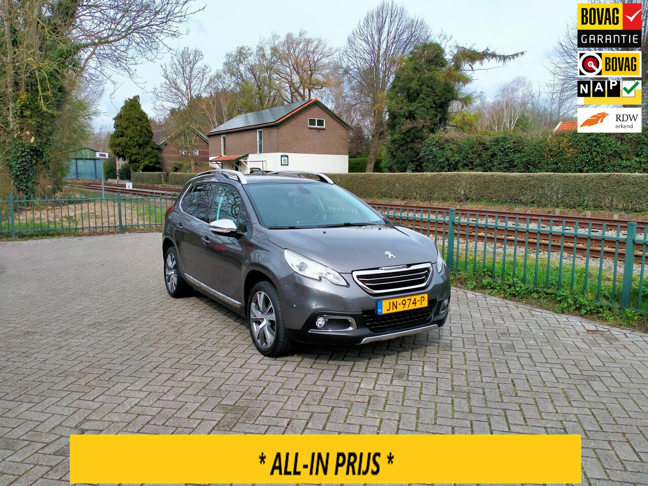 Peugeot 2008 - 1.2 PureTech Allure panoramadak trekhaak luxe uitv. RIJKLAAR - AutoWereld.nl