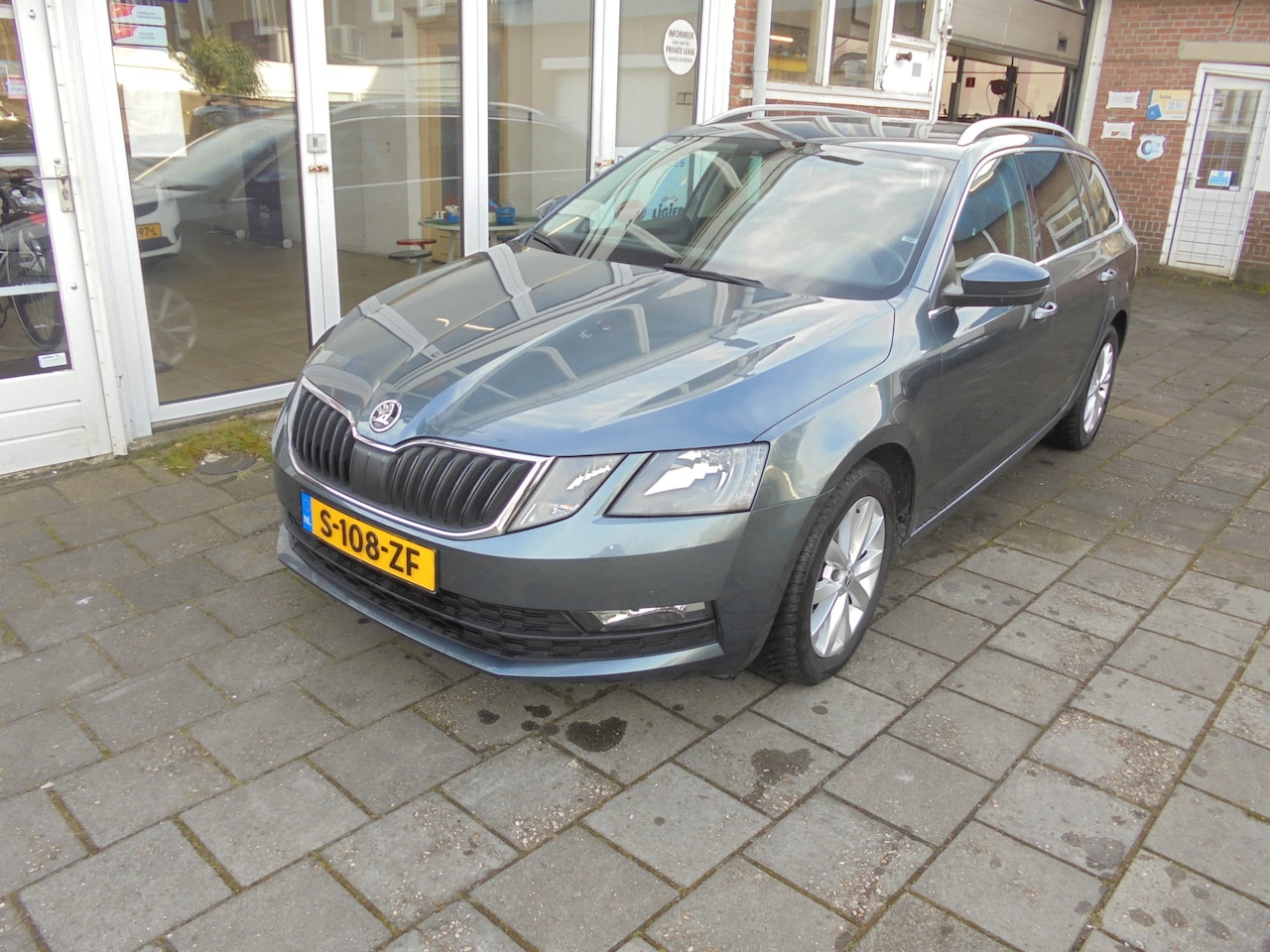 Skoda Octavia Combi - 1.0 TSI Greentech Style Business Navi Full Map, Cruise, Climate Controle, Achteruitrijcame - AutoWereld.nl