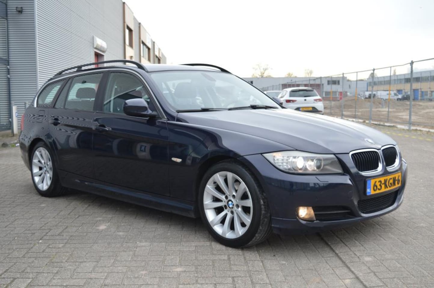 BMW 3-serie Touring - 320i High Executive bj09 airco cruise elec pak - AutoWereld.nl