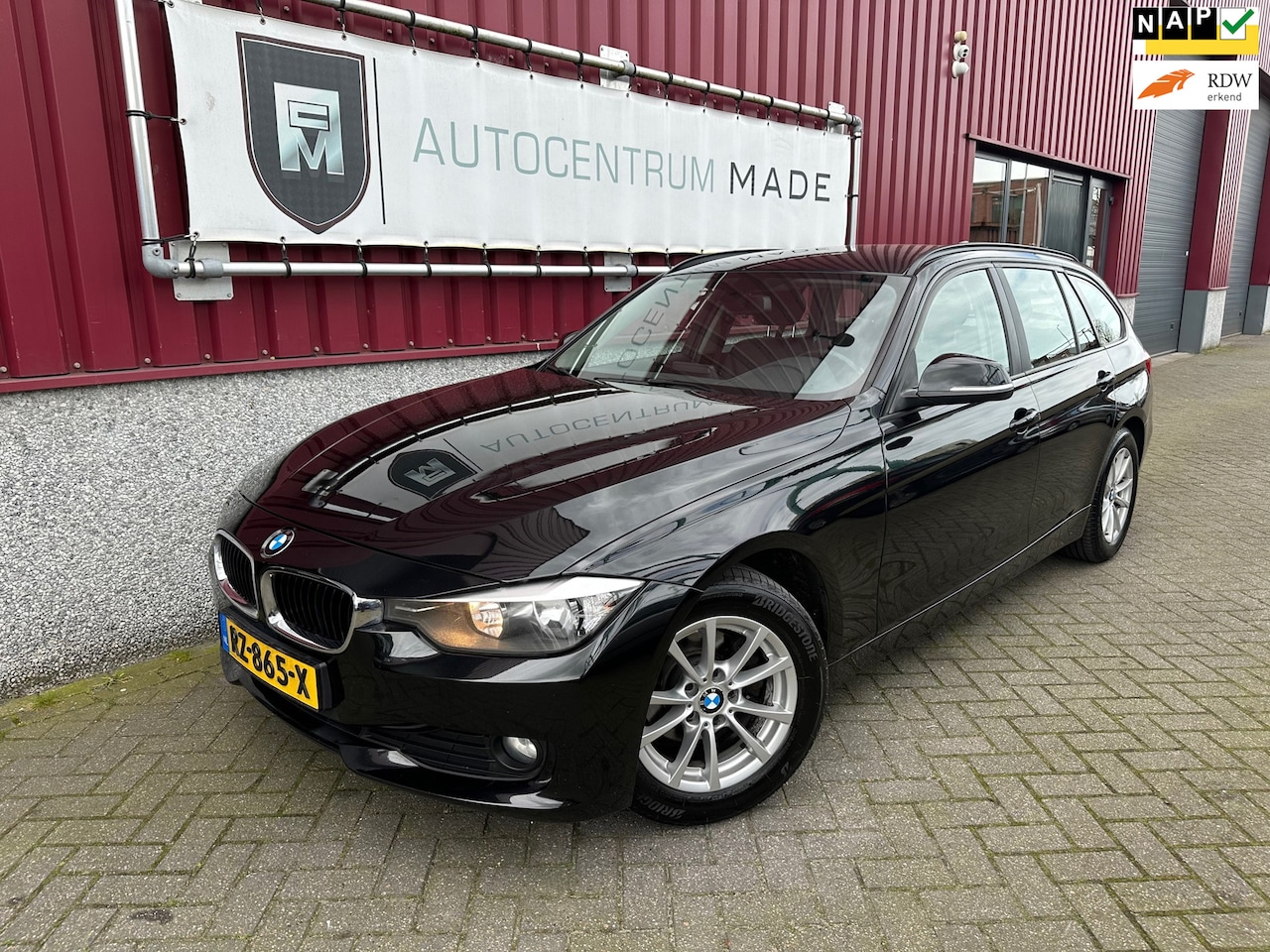 BMW 3-serie Touring - 318d High Executive // Leer // Clima // Navi // PDC - AutoWereld.nl