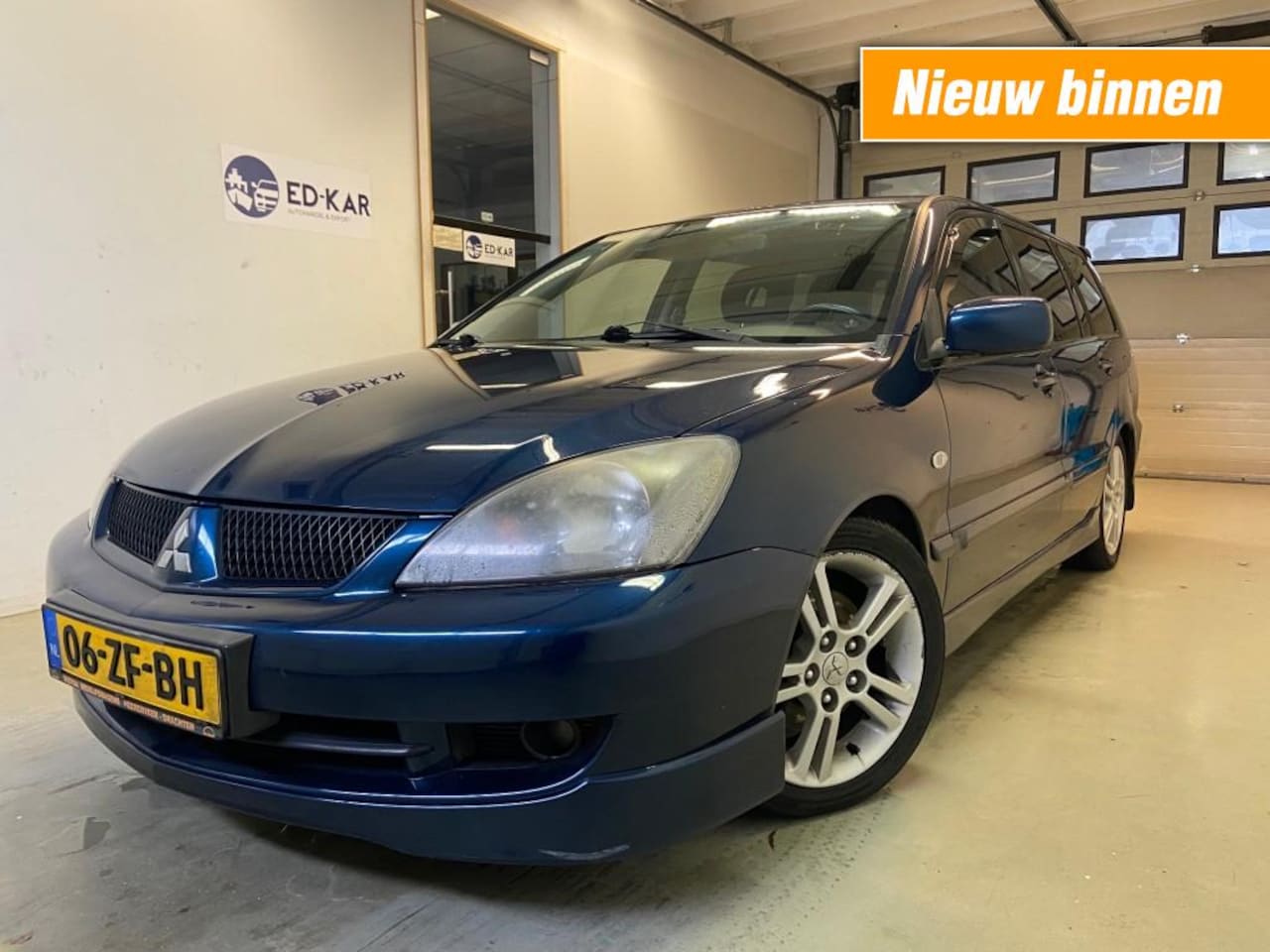 Mitsubishi Lancer Station Wagon - Station Wagon 2.0 Intense AIRCO LPG-G3 NAP N. APK 3-2025 - AutoWereld.nl