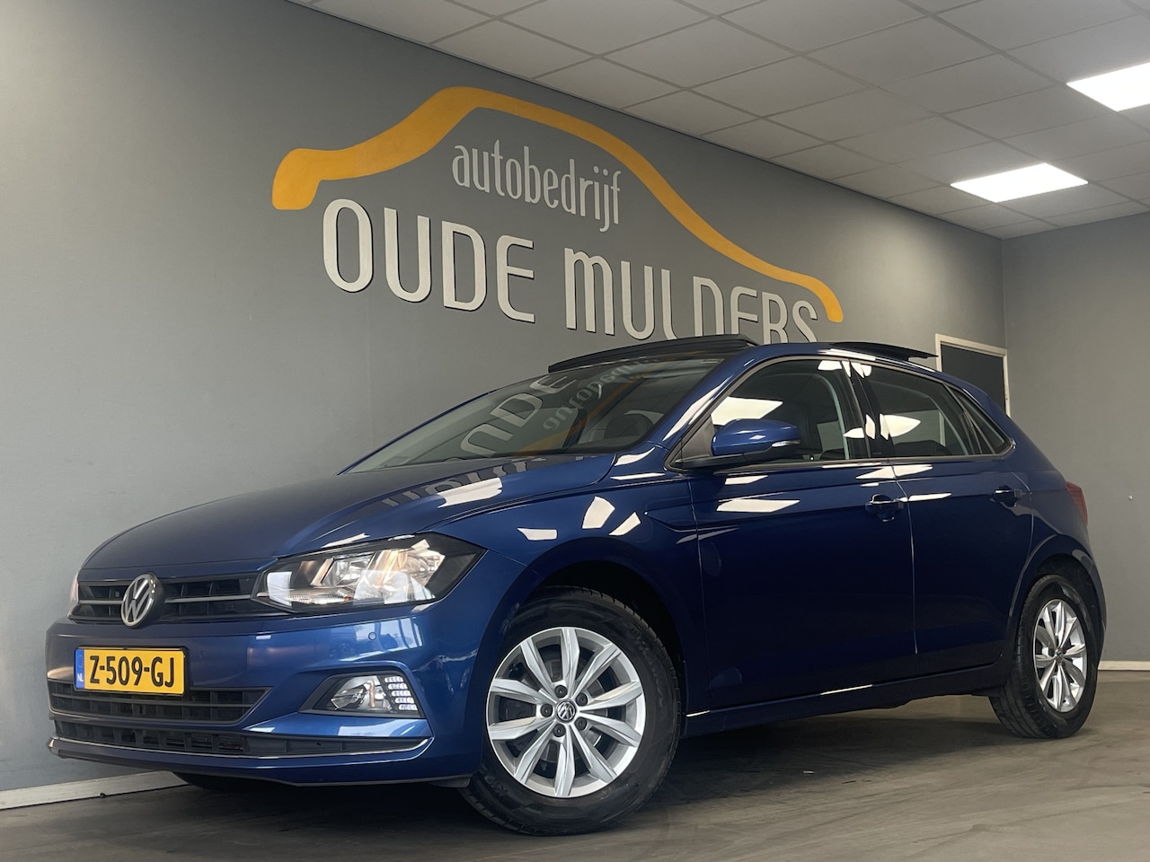 Volkswagen Polo - 1.0 TSI Highline Beatsaudio/Parkeersensoren/Stoelverwarming - AutoWereld.nl