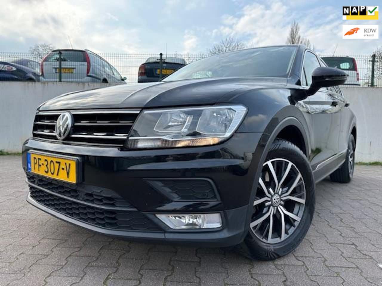 Volkswagen Tiguan - 2.0 TDI Comfortline Business/NAVI/PDC/CRUISE/NETTE AUTO/NL AUTO/ - AutoWereld.nl