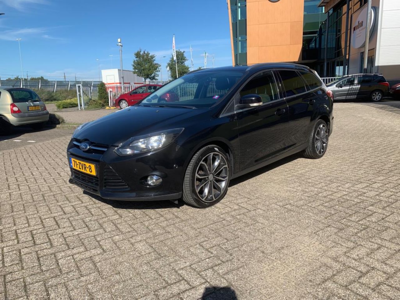 Ford Focus Wagon - 1.6 EcoBoost Titanium Zwart 2013 Airco Navi - AutoWereld.nl