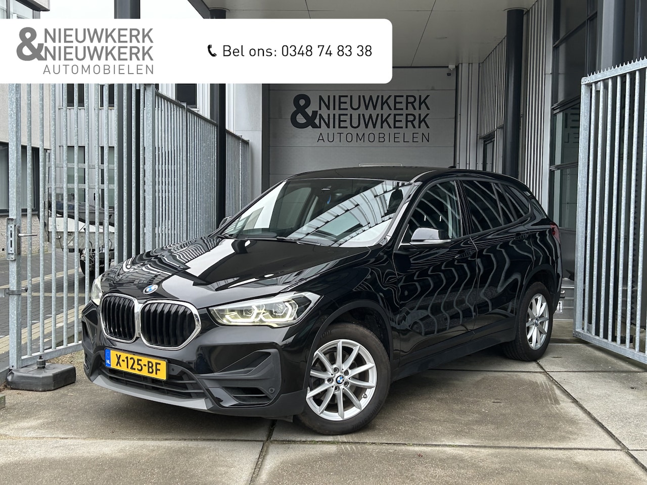 BMW X1 - sDrive18i | AUTOMAAT | NAVI | CRUISE CONTROL | PDC V+A | LMV 17'' | STOELVERWARMING | CLIM - AutoWereld.nl