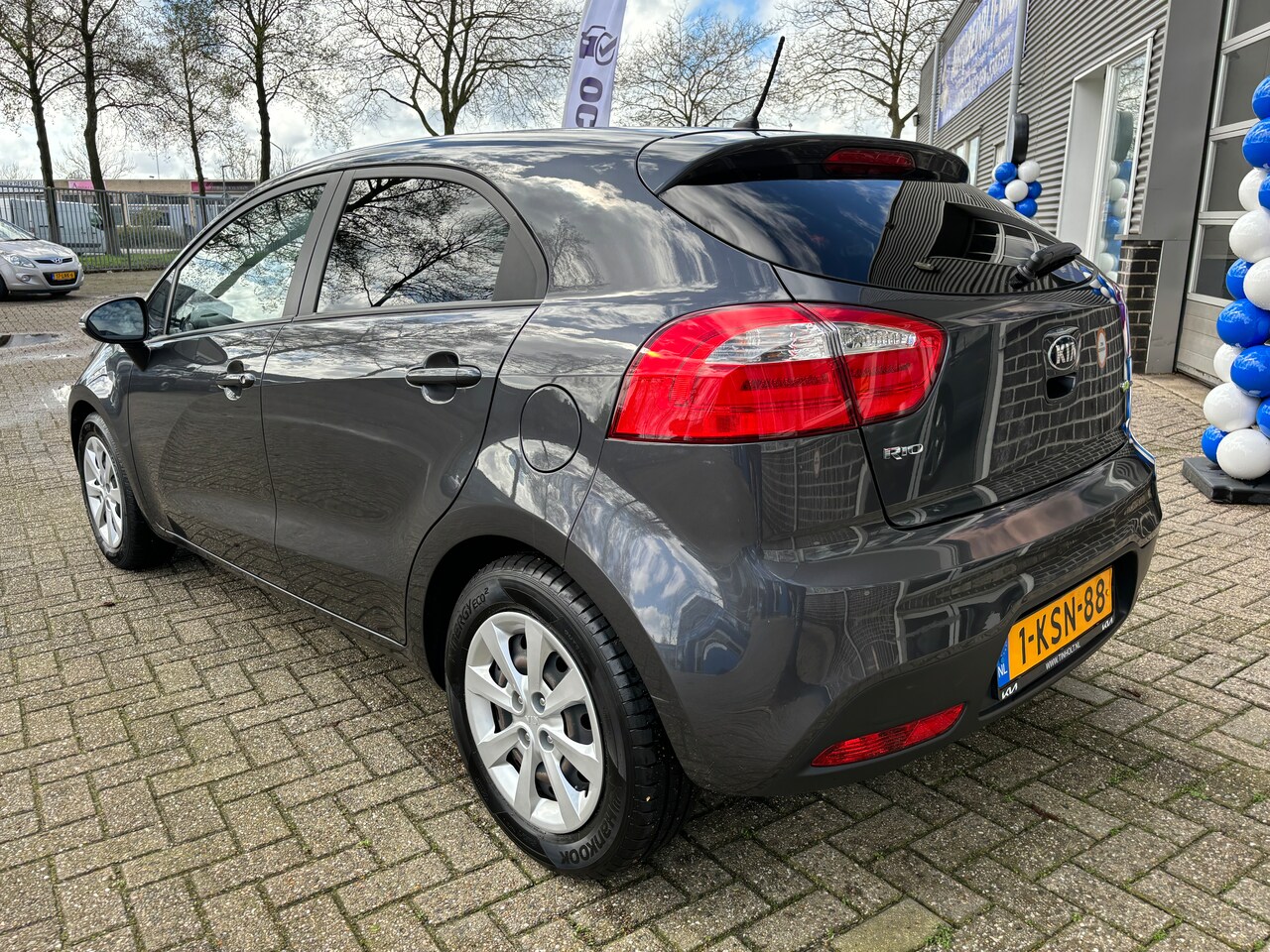 Kia Rio - 1.2 CVVT Plus Pack Org-NL auto. Airco. Navi. Lage km.