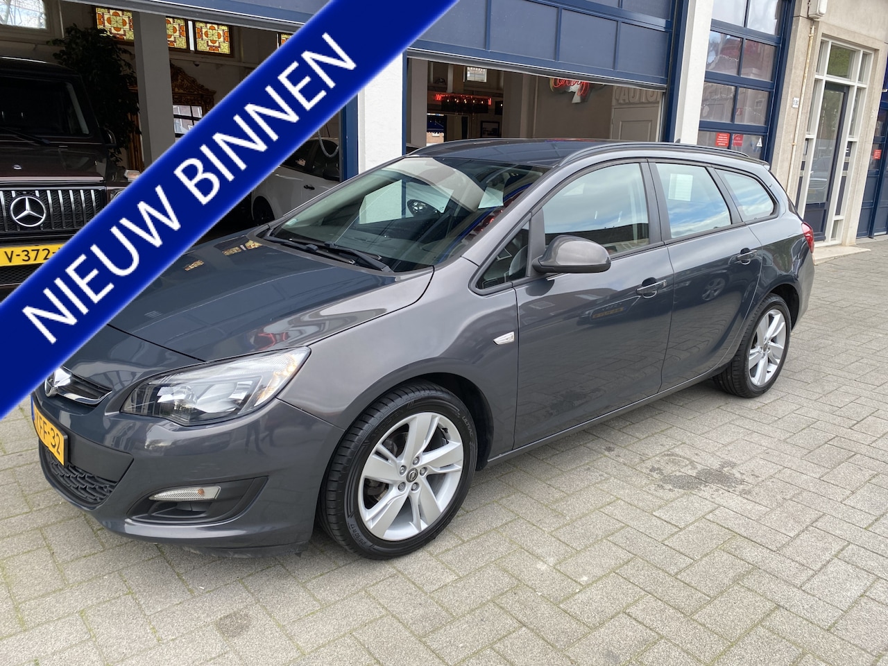 Opel Astra Sports Tourer - 1.4 Turbo Berlin NAVI/AIRCO/CRUISE/LM VELGEN - AutoWereld.nl