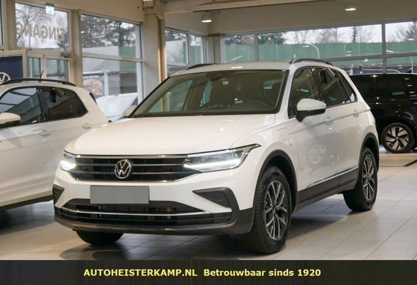 Volkswagen Tiguan - 1.4 TSI eHybrid ACC LED Navi Camera Trekhaak - AutoWereld.nl