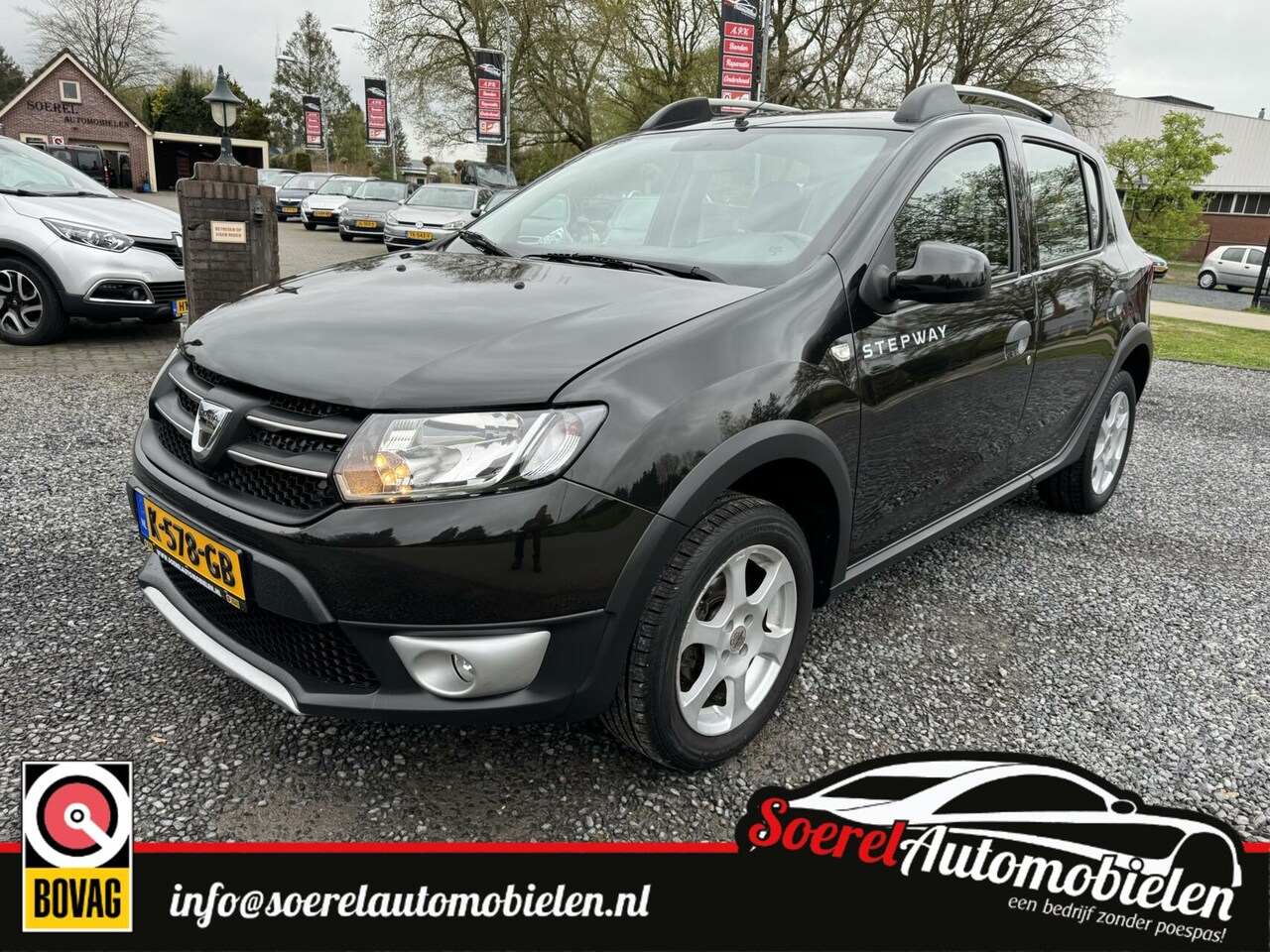 Dacia Sandero - 0.9 TCe Laureate 0.9 TCe Lauréate,cruise,airco,p.sens,navi, boekjes - AutoWereld.nl