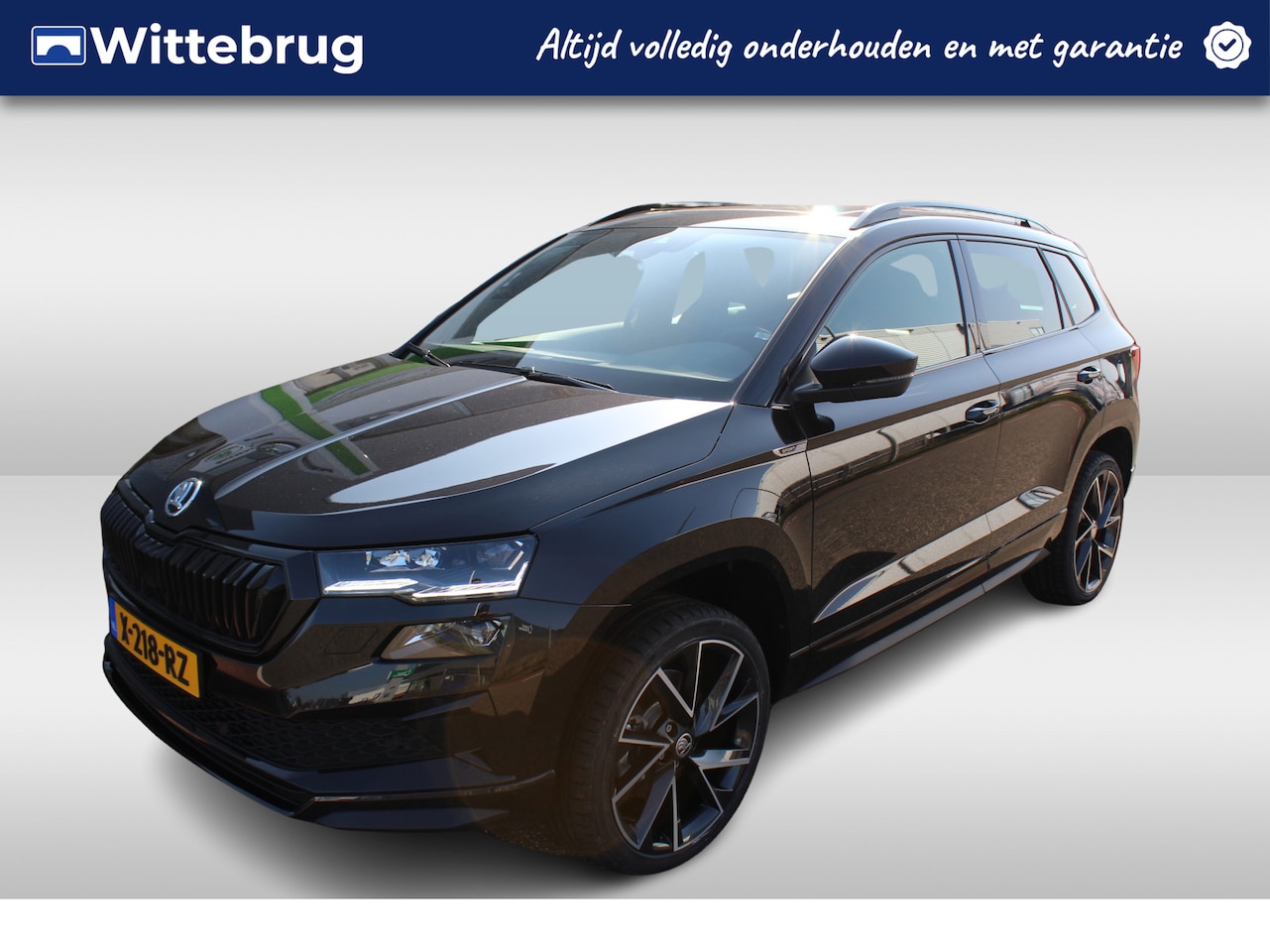 Skoda Karoq - 1.5 TSI ACT Sportline Business / PANODAK / 19"LMV / NAVI / APP.Connect - AutoWereld.nl