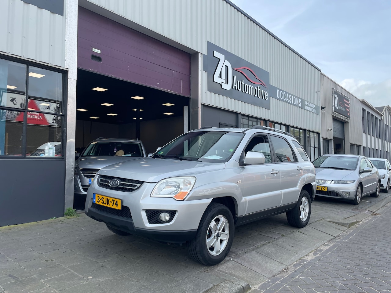 Kia Sportage - 2.0 CVVT X-pect 2.0 CVVT X-pect - AutoWereld.nl