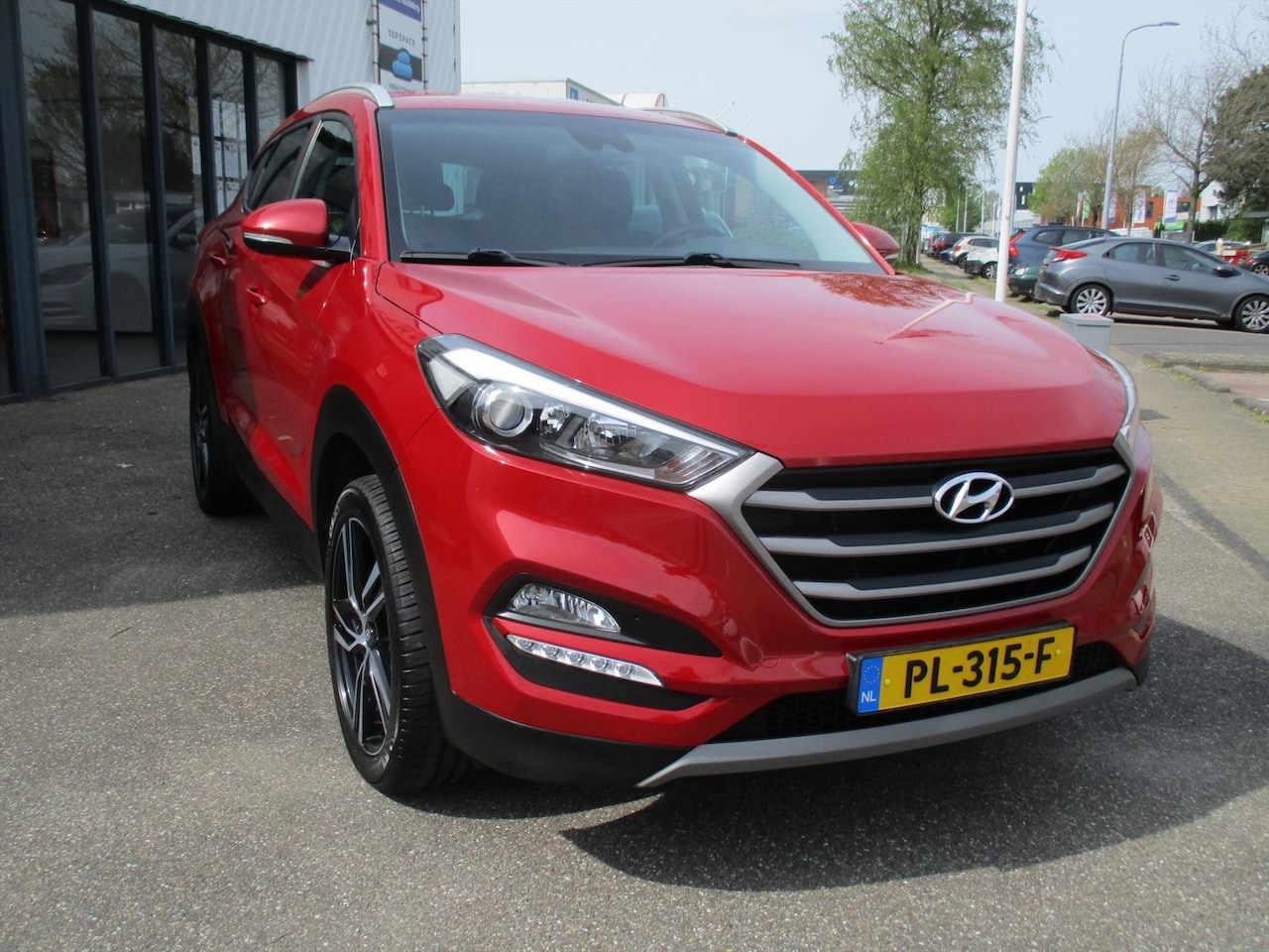 Hyundai Tucson - 1.6 GDi Anniversary Edition Navigatie Trekhaak - AutoWereld.nl