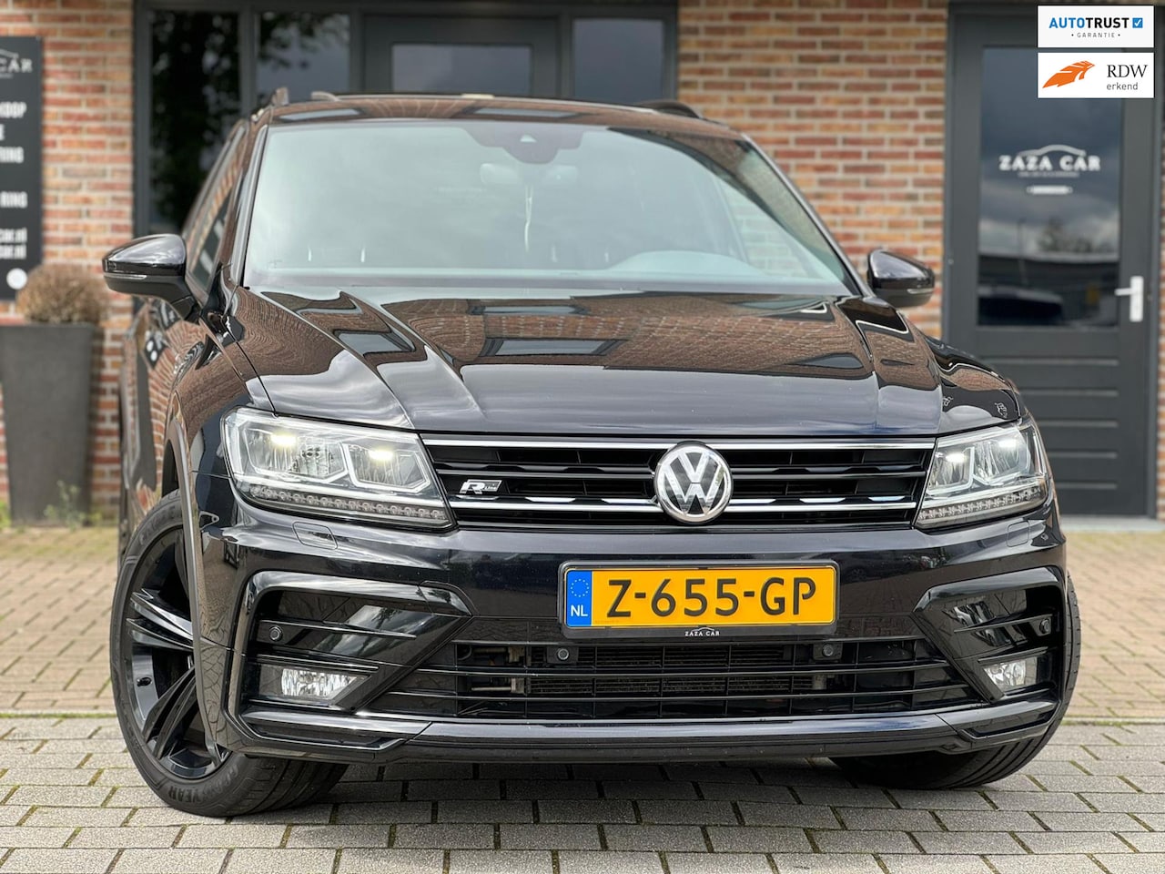 Volkswagen Tiguan - 2.0 TSI 4Motion R-Line 230pk Pano Highline - AutoWereld.nl