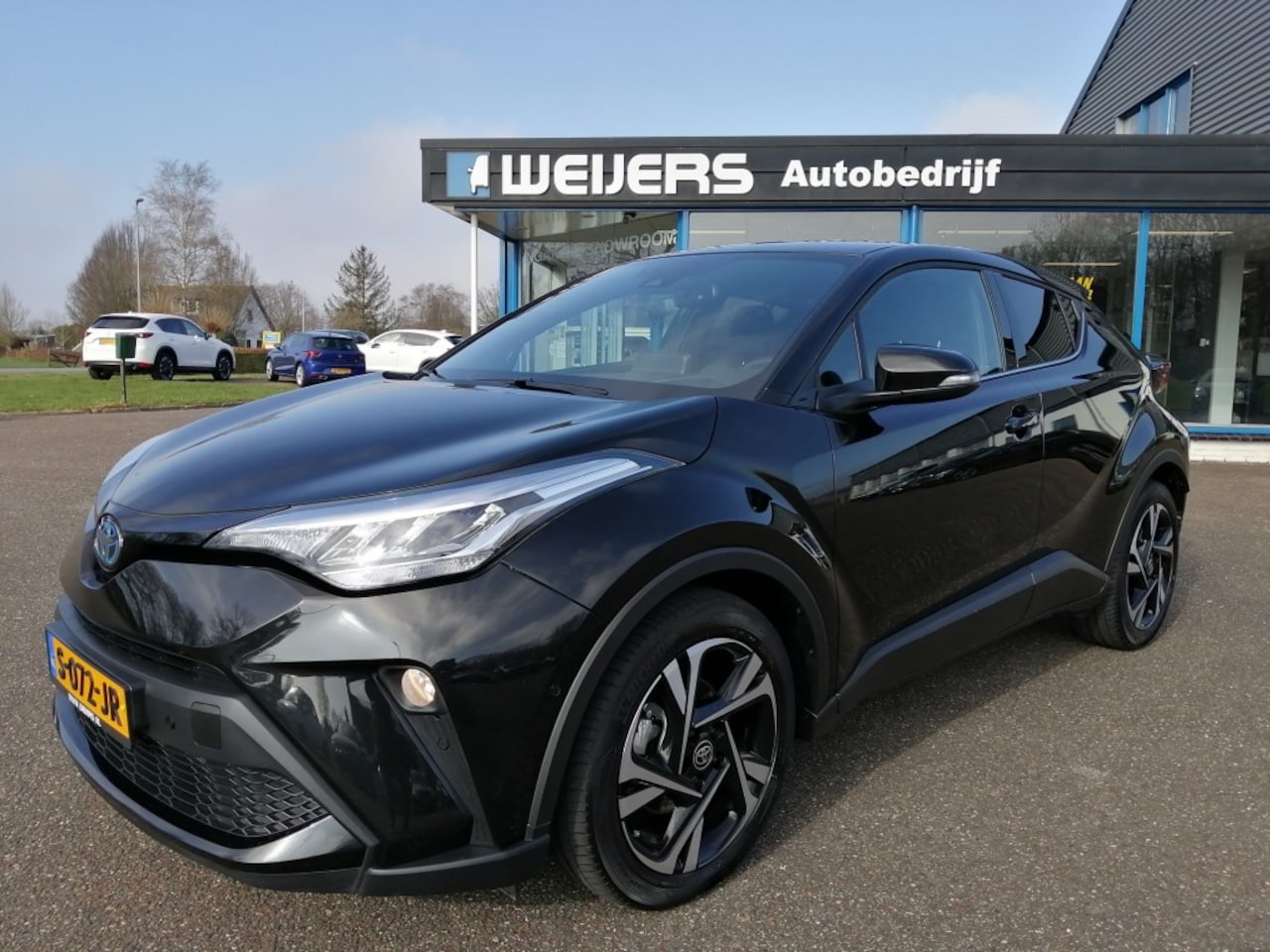 Toyota C-HR - 2.0 Hybride 184pk! Style, Navi, Clima, Camera, PDC, Cruise - AutoWereld.nl