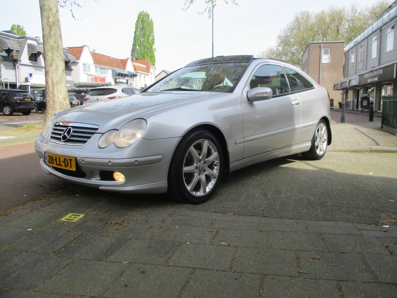 Mercedes-Benz C-klasse Sportcoupé - 200 K. DESIGNO / AUTOMAAT / AIRCO / SCHUIFDAK/ LEER / NL-AUTO / 140dkm - AutoWereld.nl