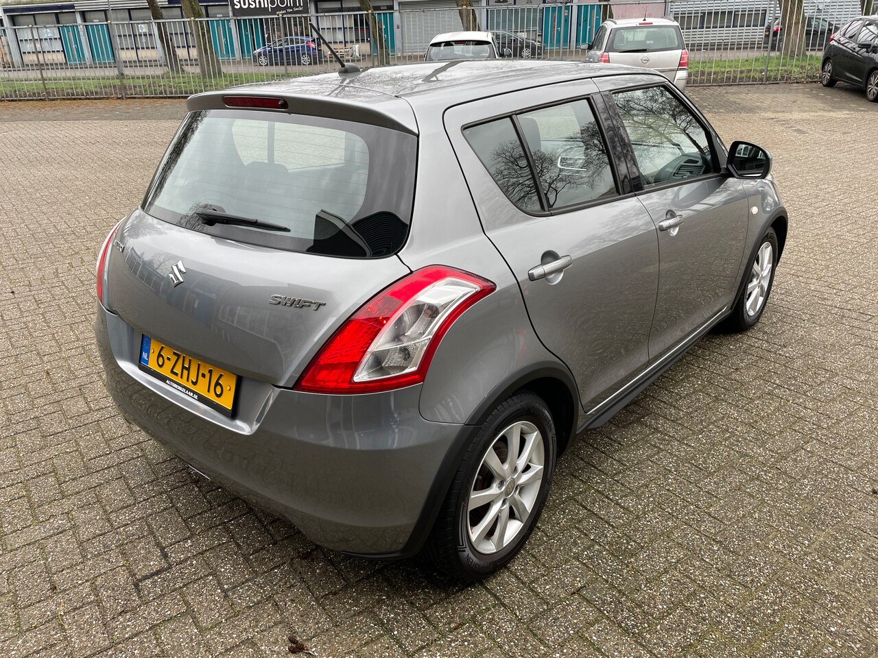 Suzuki Swift - 1.2 Dynamic EASSS Org-NL auto. Airco. Complete uitvoering.