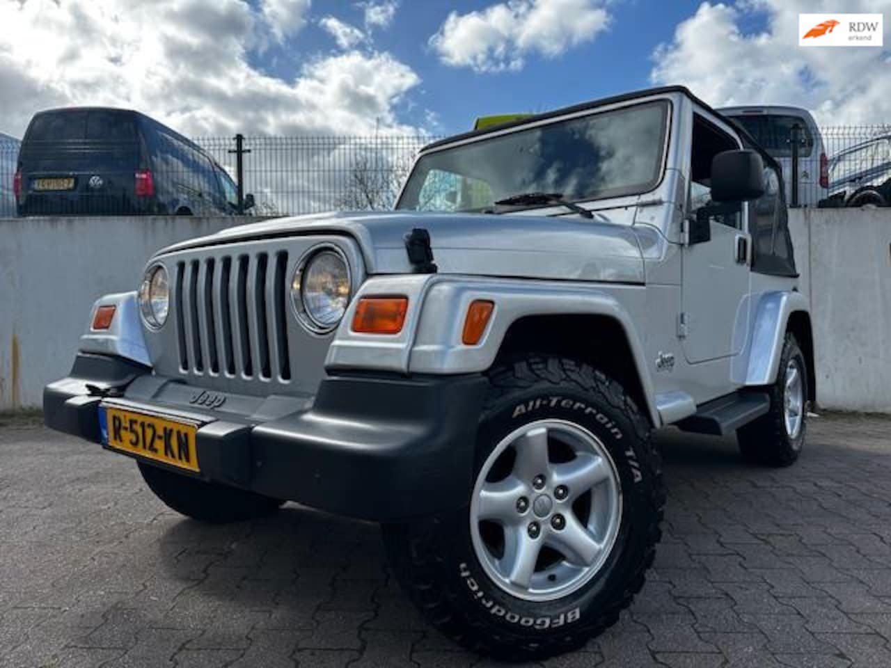 Jeep Wrangler - 4.0i Hardtop Sahara/AUTOMAAT/MET MAAR 36127 KM/UNIEK/ - AutoWereld.nl