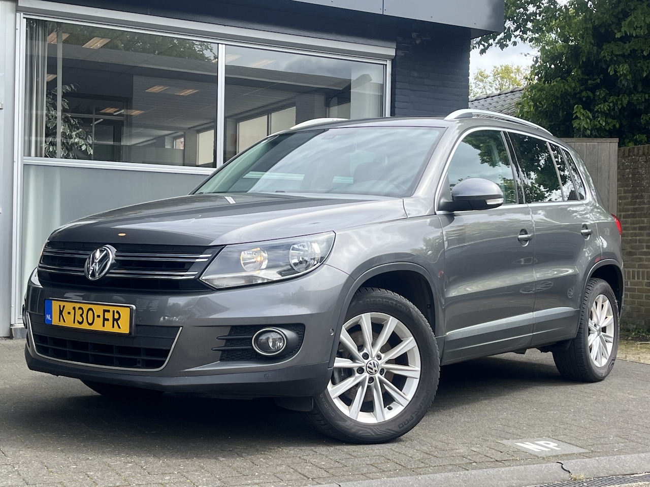 Volkswagen Tiguan - 1.4 TSI Sport&Style CLIMA / PANO / CRUISE / NAVI - AutoWereld.nl