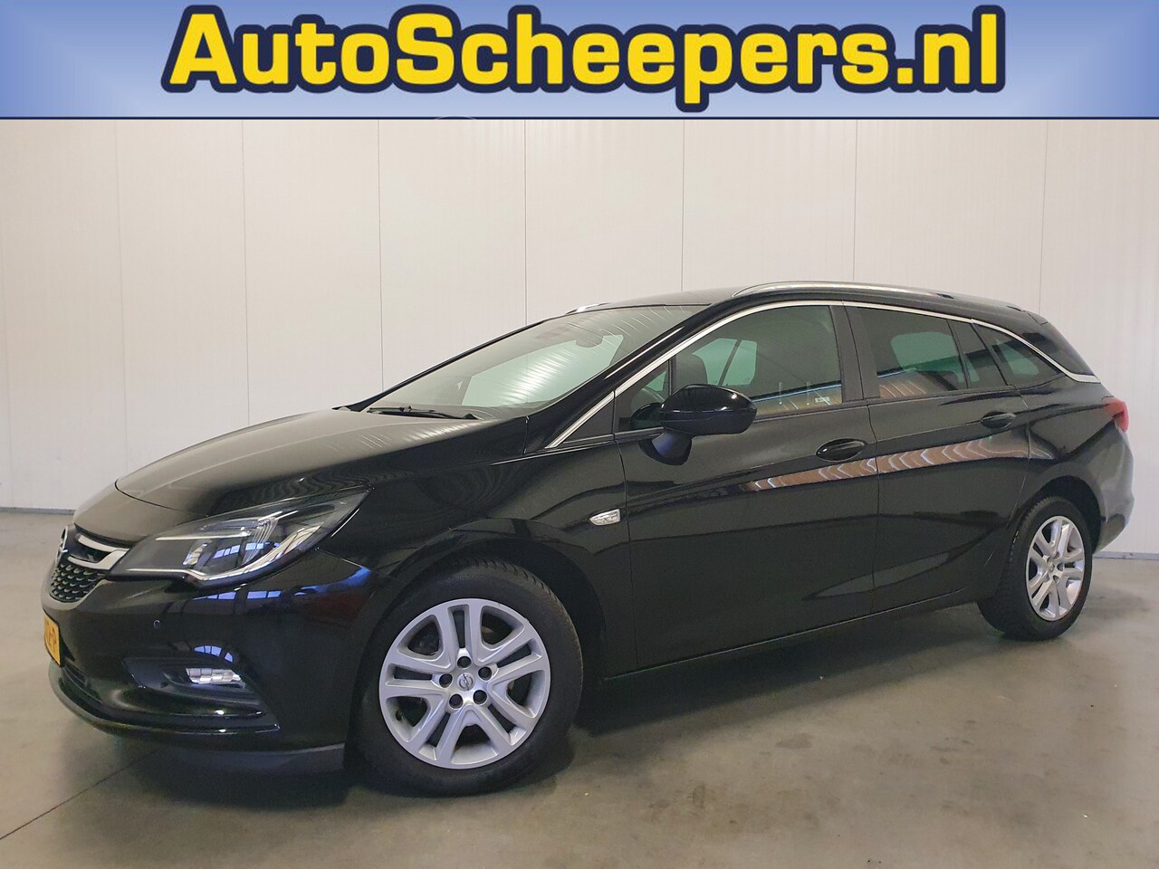 Opel Astra Sports Tourer - 1.0 Online Edition NAVI/CARPLAY/PDC/CLIMA/CAMERA - AutoWereld.nl