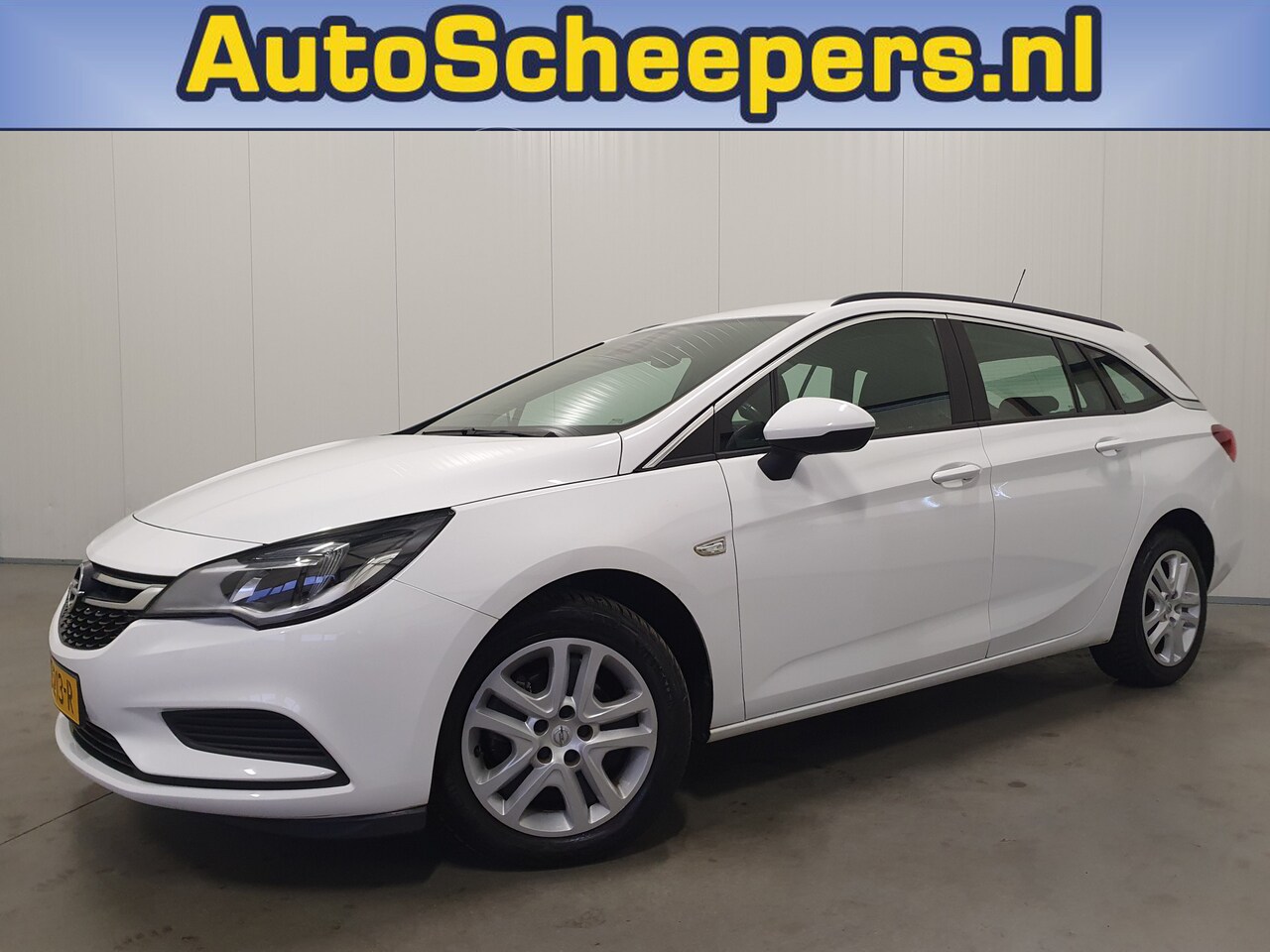 Opel Astra Sports Tourer - 1.0 Turbo Business+ NAVI/CRUISE/AIRCO/TRHAAK - AutoWereld.nl