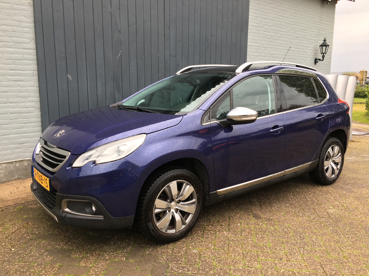 Peugeot 2008 - 1.2 VTi Allure Pack Panorama dak, Leder - AutoWereld.nl