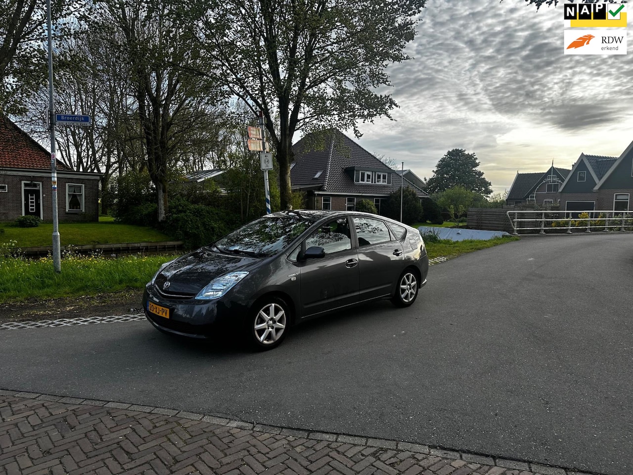 Toyota Prius - 1.5 VVT-i Comfort Clima.Navi - AutoWereld.nl