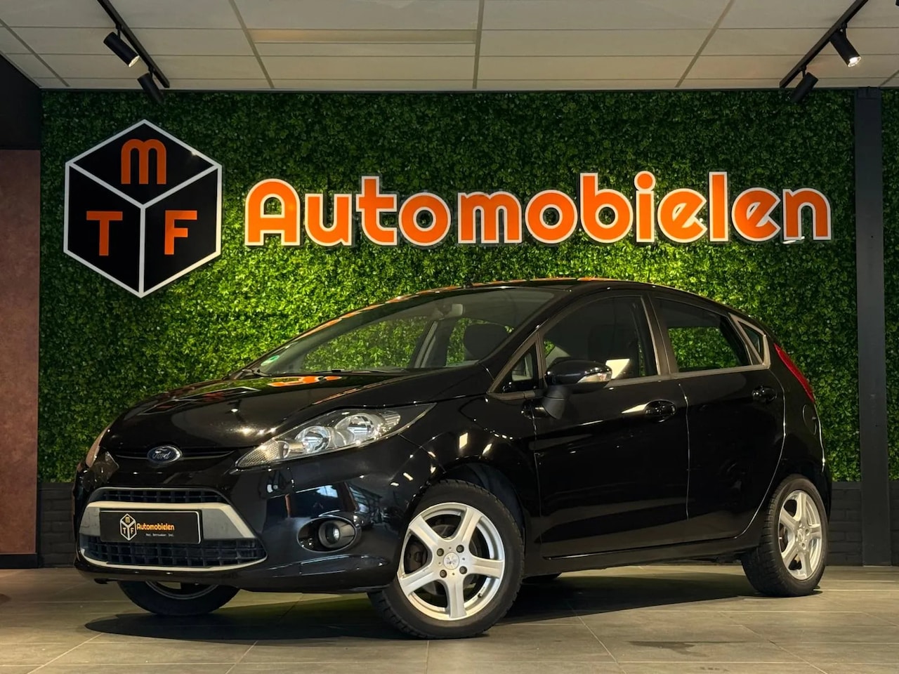 Ford Fiesta - 1.4 Ghia 1.4 Ghia - AutoWereld.nl