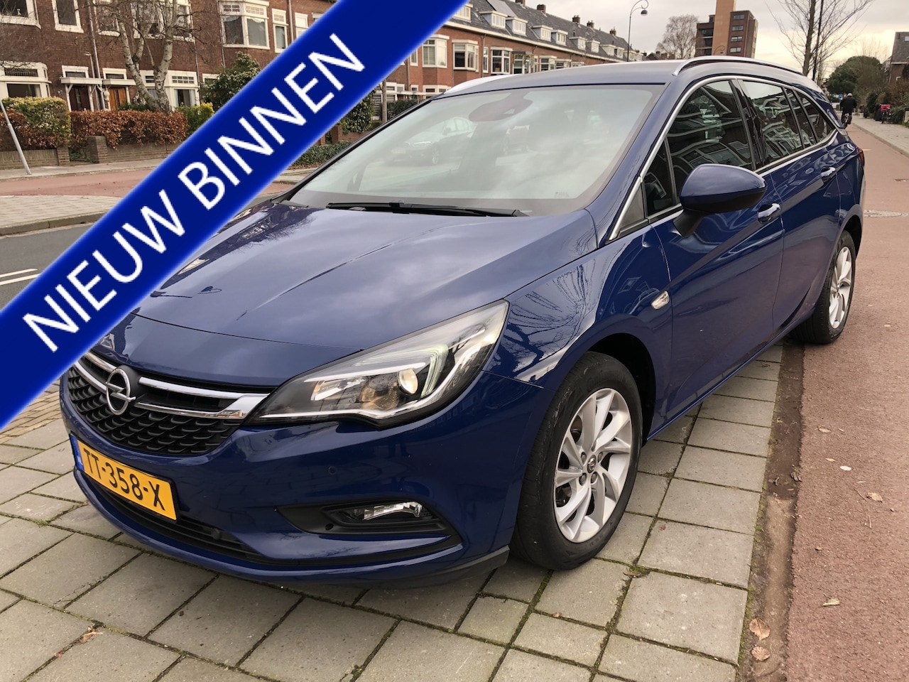 Opel Astra Sports Tourer - 1.0 Turbo Business Executive navigatie airco/ecc - AutoWereld.nl