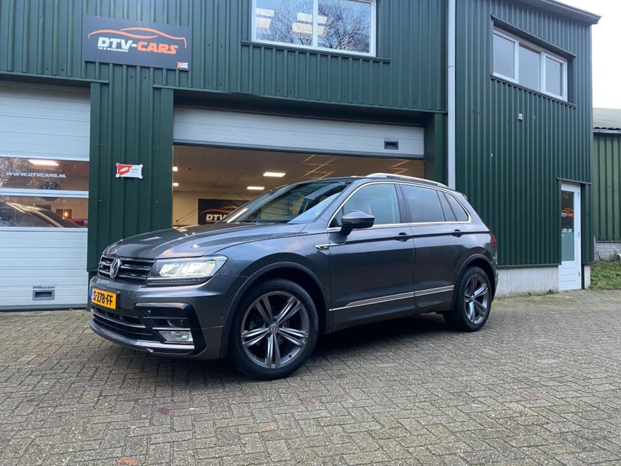 Volkswagen Tiguan - 1.4Tsi Dsg R-Line pano leer camera - AutoWereld.nl