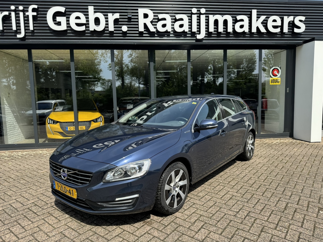 Volvo V60 - 2.4D6 AWD Hybrid Momentum*navi*ECC*EXPORT/EX.BPM* - AutoWereld.nl