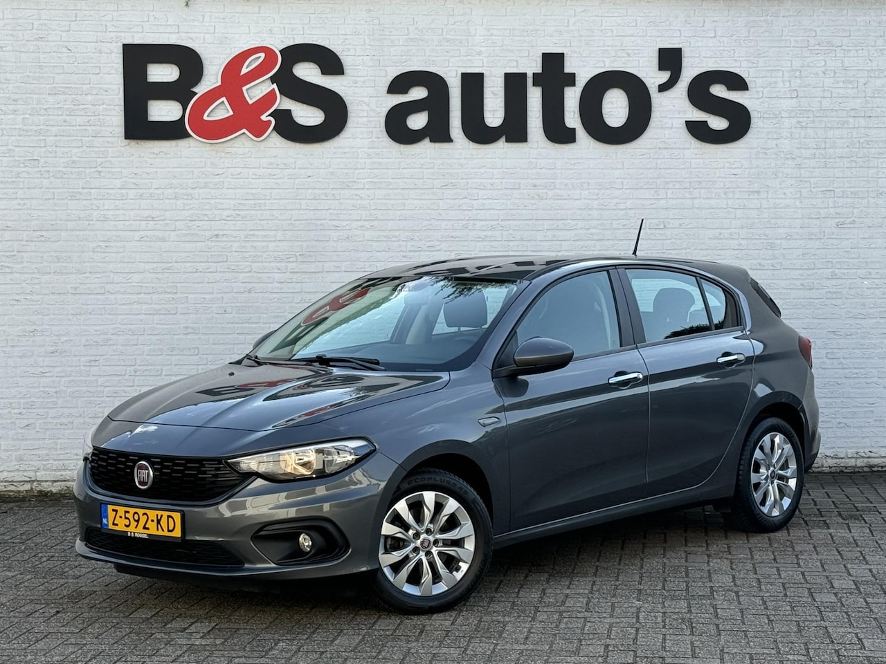 Fiat Tipo - 1.4 Mirror Navigatie Clima Cruise 4 Seizoenen banden Stoelverwarming - AutoWereld.nl