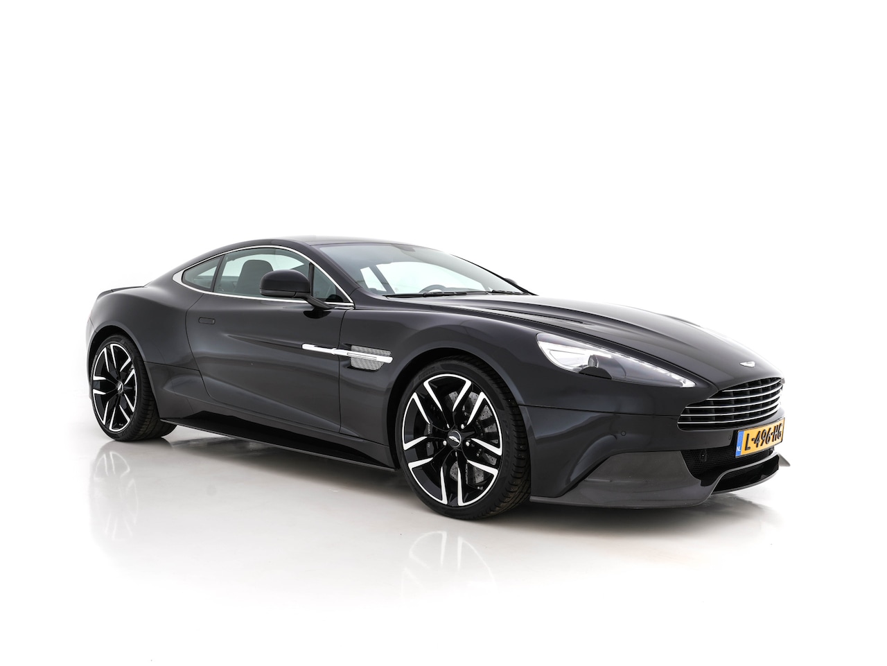 Aston Martin V12 Vanquish - 6.0 Touchtronic 2+2 *CERAMIC-BRAKES | B&O-SURROUND | CARBON | VOLLEDER | XENON | MEMORY-PA - AutoWereld.nl