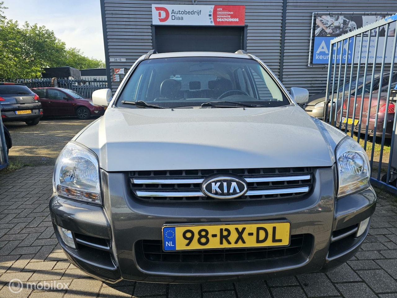 Kia Sportage - 2.0 CVVT Executive 2.0 CVVT Executive - AutoWereld.nl