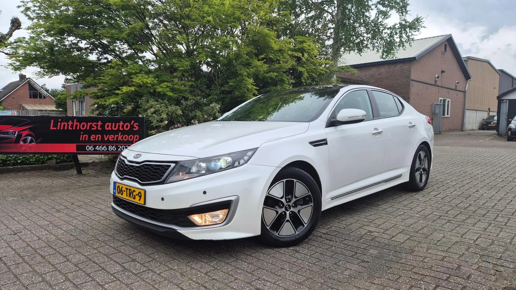 Kia Optima - 2.4 hybrid - AutoWereld.nl