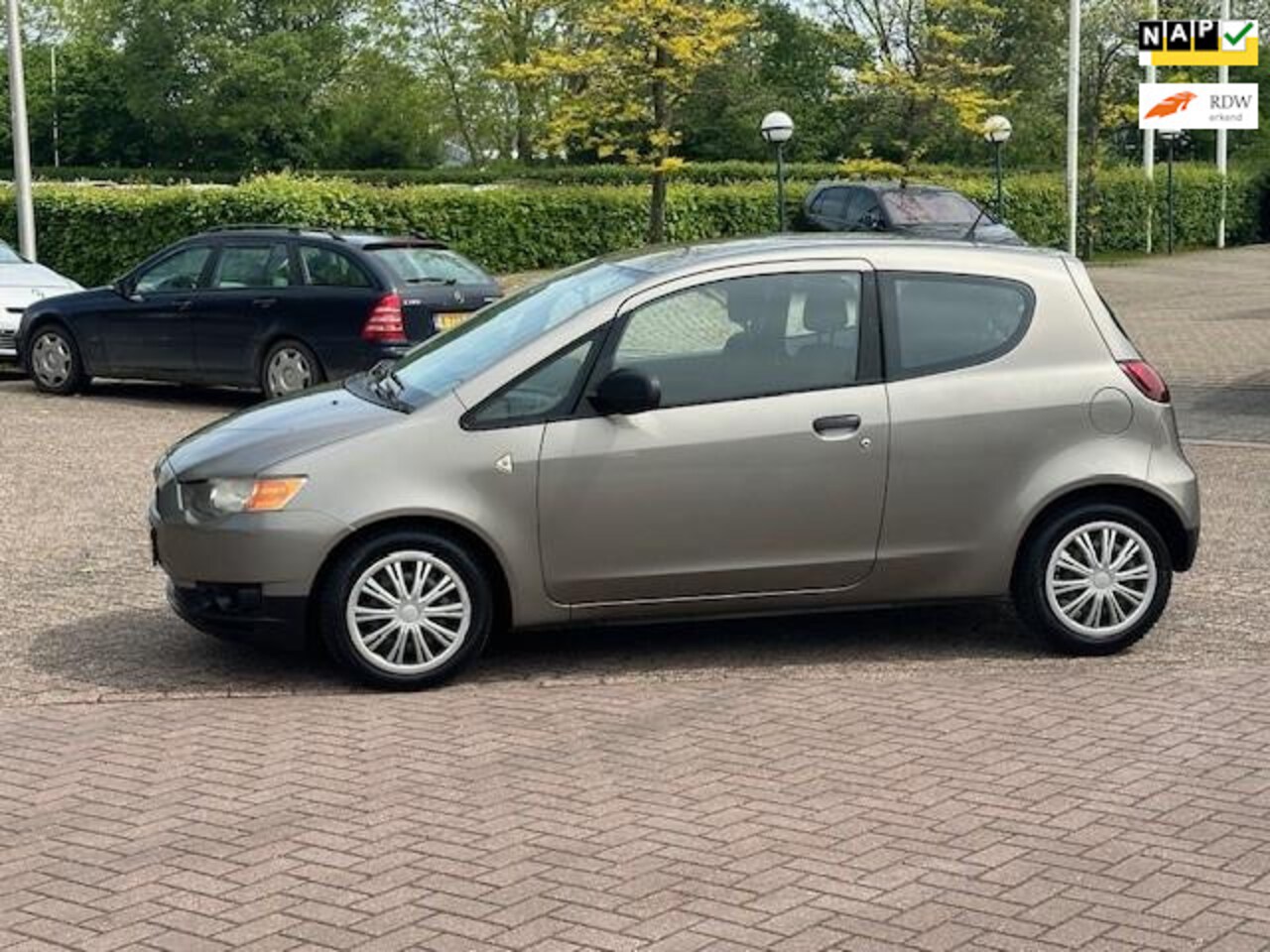 Mitsubishi Colt - 1.1 Inform 1.1 Inform,bj.2009,kleur:grijs ! Airco,APK tot 06/2025 en NAP met 221559 km.trekhaak,zeer - AutoWereld.nl