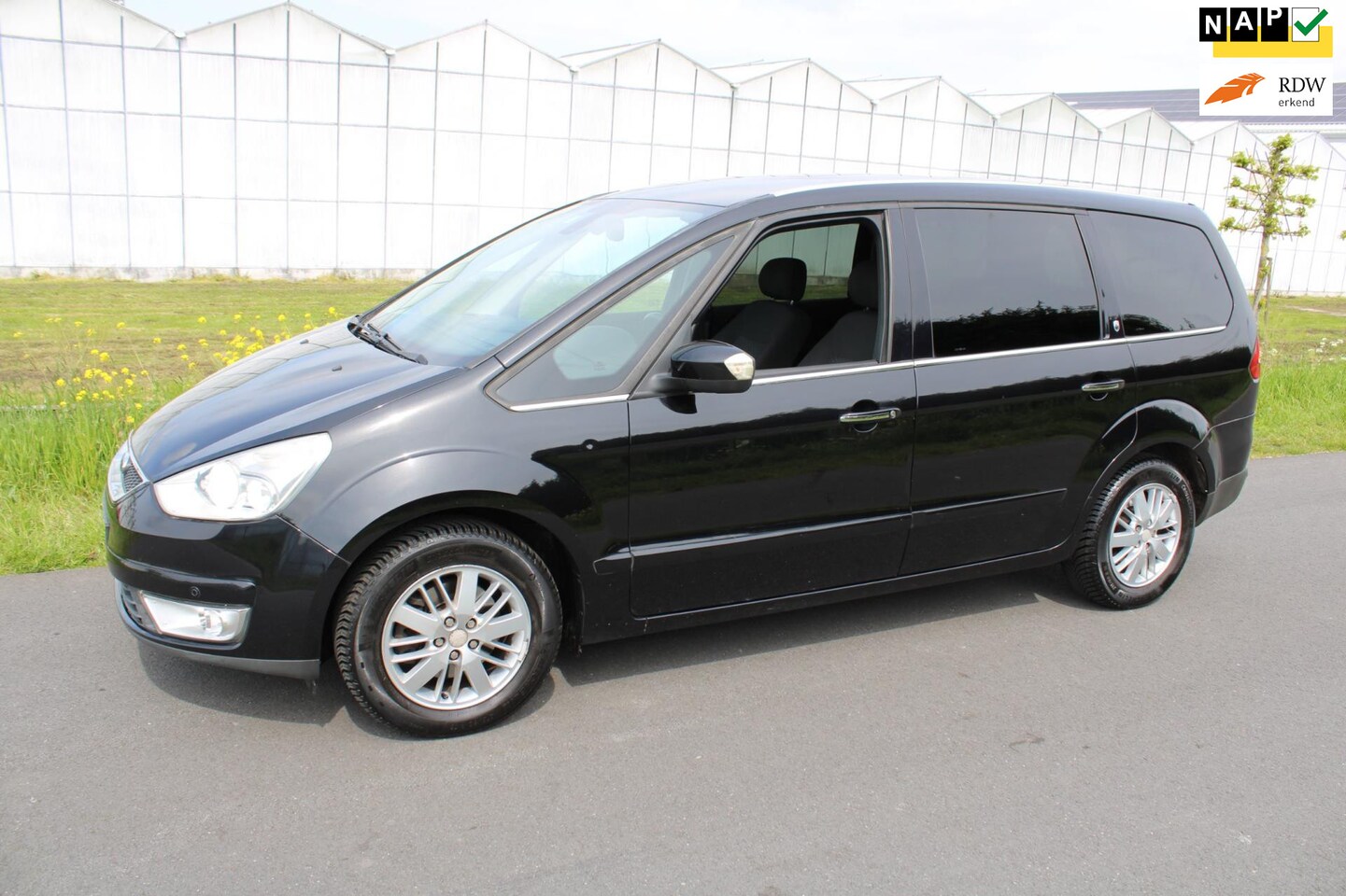 Ford Galaxy - 2.0-16V Ghia 7 Persoons - AutoWereld.nl