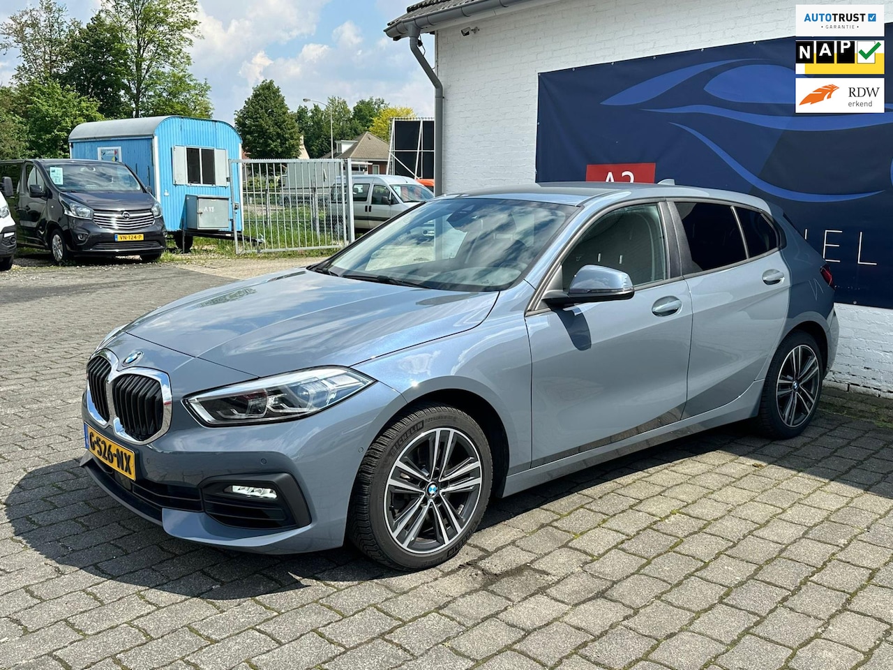 BMW 1-serie - 118i Executive Edition / DIGITAL DASH / ACHTERUITRIJCAMERA / AUTOMAAT - AutoWereld.nl