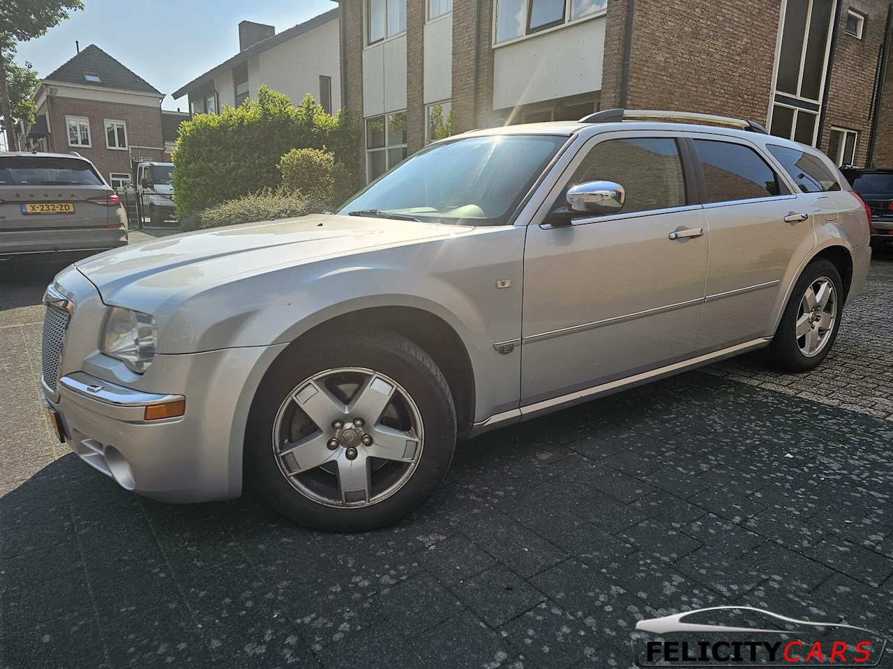 Chrysler 300C - 3.5 V6 awd 4x4 navi leer 20 inch chroom - AutoWereld.nl