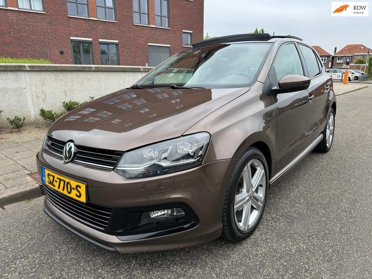 Volkswagen Polo - 1.4 TDI Highline R-Line DSG /Climate/PANO/Cruise/Camera/Sound - AutoWereld.nl