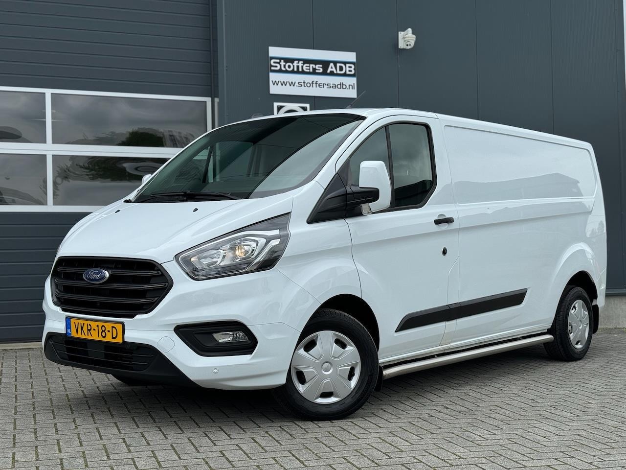 Ford Transit Custom - 2.0 EcoBlue 130pk L2H1 Trend | Trekhaak 2800KG | Winterpack | Airco | Cruise | Bluetooth | - AutoWereld.nl