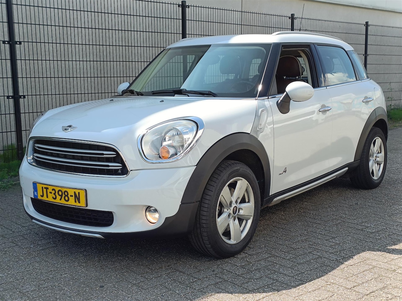 MINI Countryman - 1.6 Cooper ALL4 Pepper Automaat | Leer - AutoWereld.nl