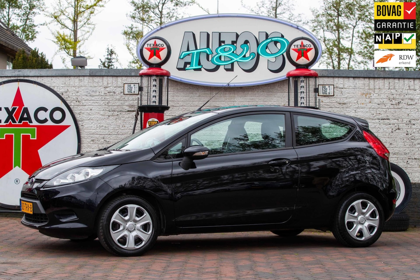 Ford Fiesta - 1.25 Ghia Airco PDC NL-auto 65.700 km + NAP - AutoWereld.nl