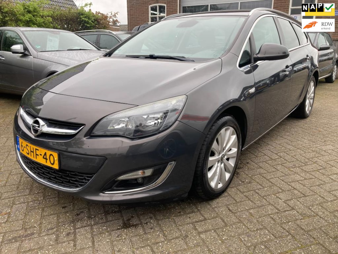 Opel Astra Sports Tourer - 1.4 Turbo Cosmo Bj 2013, Navi, Cruise, veel opties, inruil is mogelijk - AutoWereld.nl