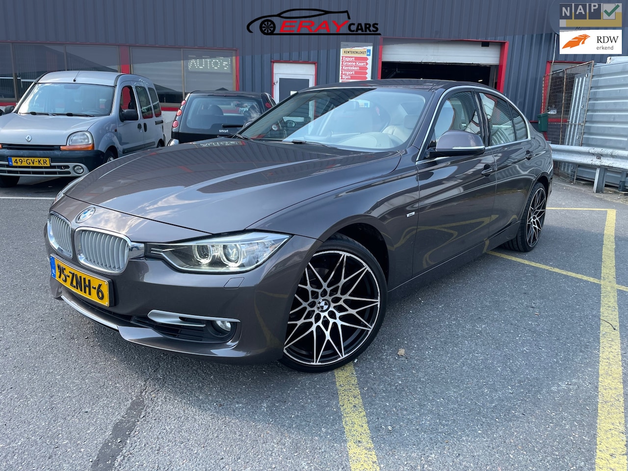 BMW 3-serie - 320i High Executive / NAP / AUTOMAAT / LEER / SP VLG / - AutoWereld.nl