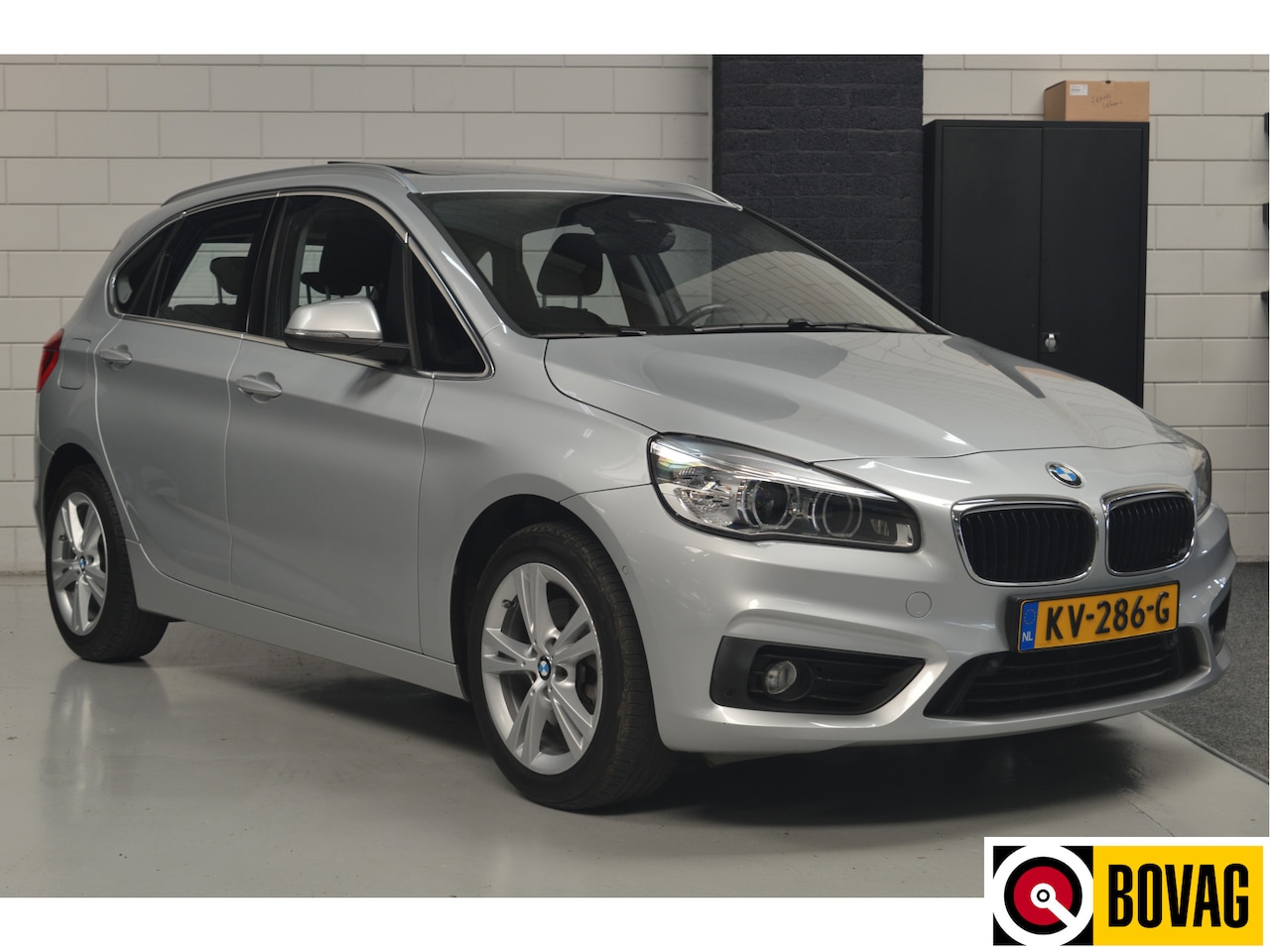 BMW 2-serie Active Tourer - 218i Centennial High Executive // 69.000 km // PANO // CLIMA // CRUISE // PDC // NAVI // S - AutoWereld.nl