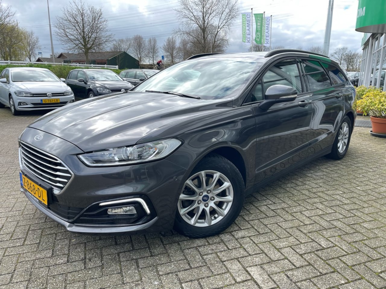 Ford Mondeo Wagon - 2.0 IVCT HEV Titan. Carplay, Nav, Clima, Camera - AutoWereld.nl