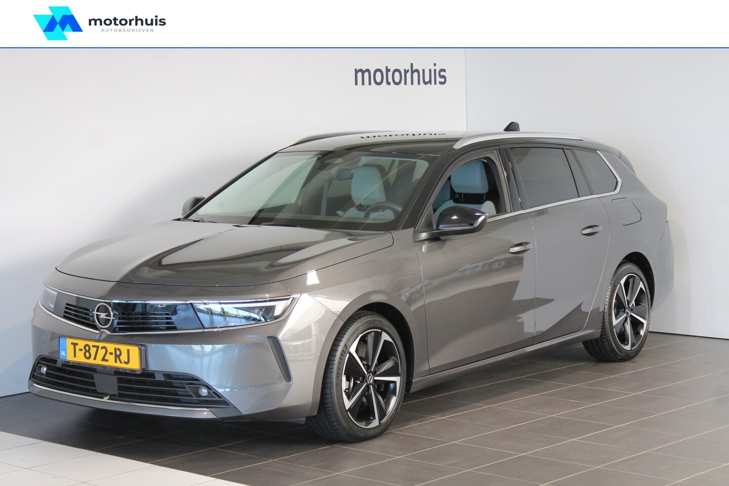 Opel Astra Sports Tourer - 1.6 T PHEV 180PK Aut ELEGANCE NAVI LED CAMERA WINTERPACK - AutoWereld.nl