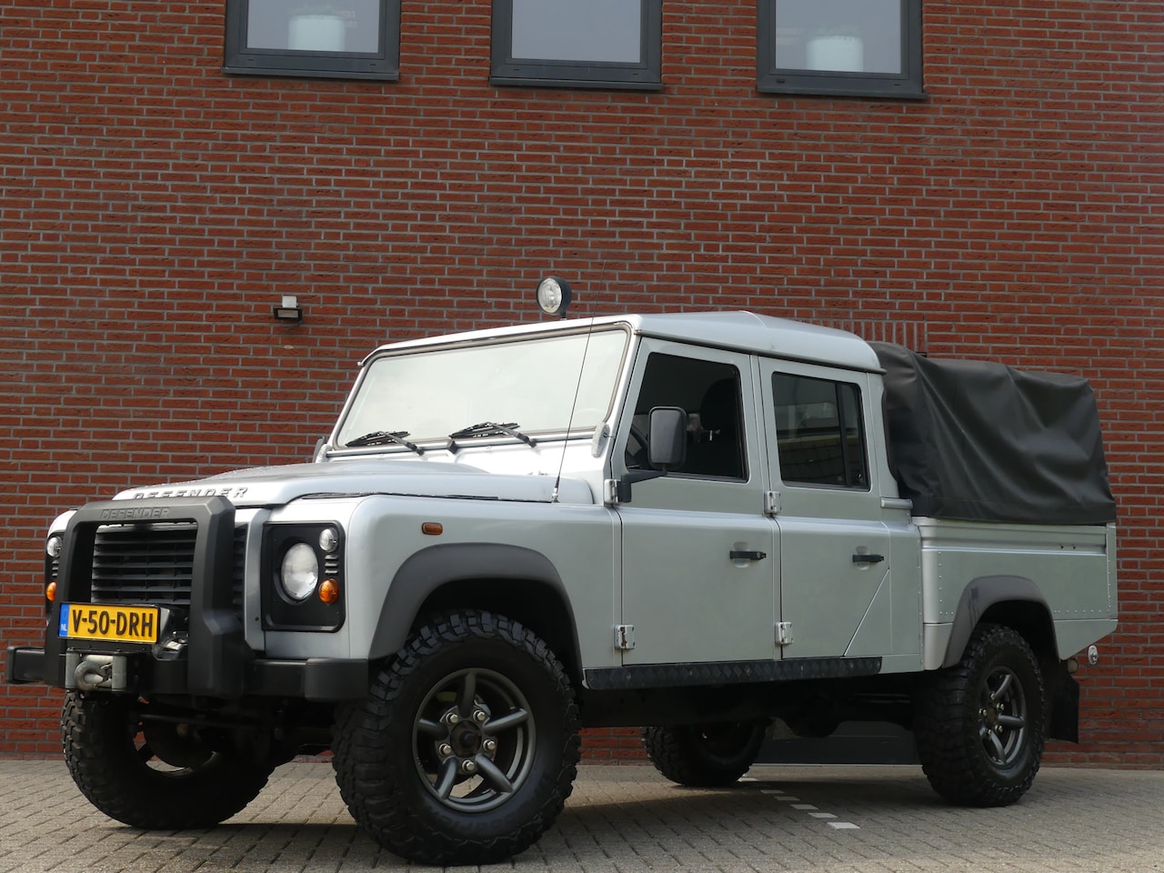 Land Rover Defender - 2.2 D 130" E Crew Cab 5 Persoons Airco - AutoWereld.nl